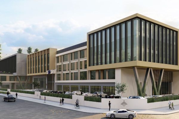 Taaleem rings market opening bell celebrating listing at DFM